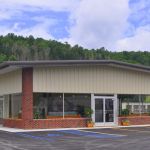 A large parking area is available for trailers. Two entrances provide pull-through access A large parking area is available for trailers. Two entrances provide pull-through access